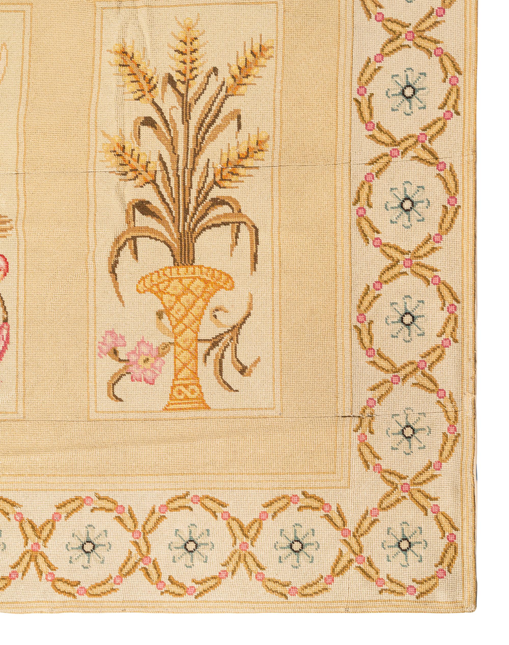 A Large Needlepoint Wool Rug