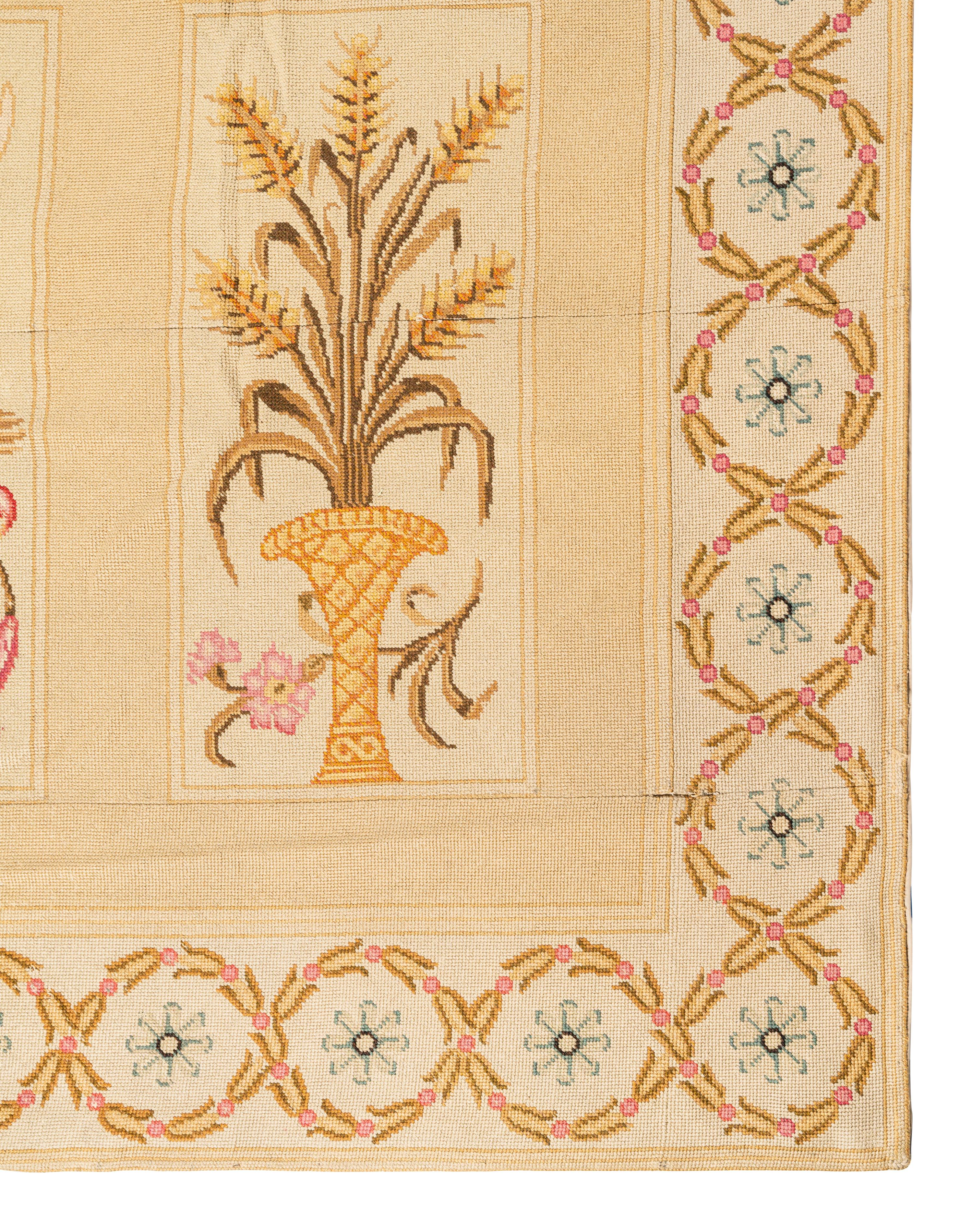 A Large Needlepoint Wool Rug
