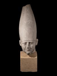 A Cast Stone Head of a Pharaoh Wearing a Hedjet Crown