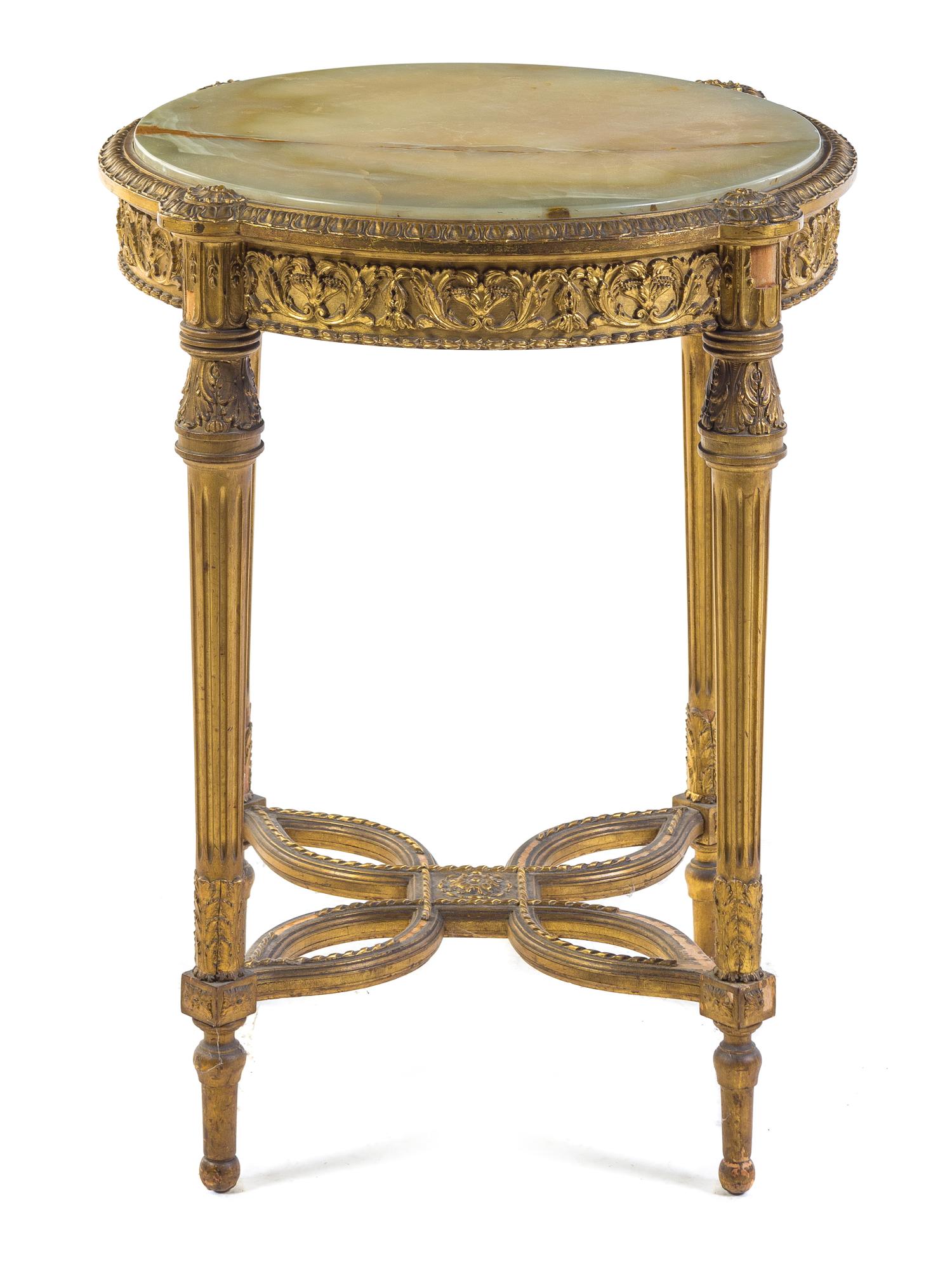 A Louis XVI Style Giltwood Gueridon Height 29 1/2 x depth 24 inches.