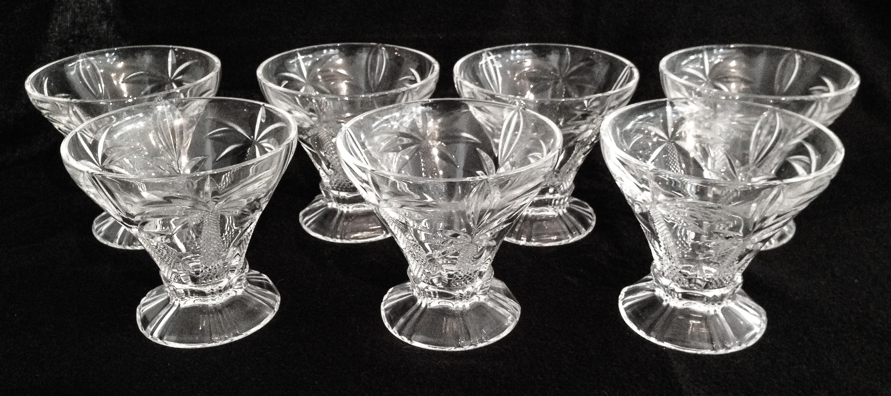 Twelve Molded Glass Sherbet Glasses Height 4 1/4 inches.