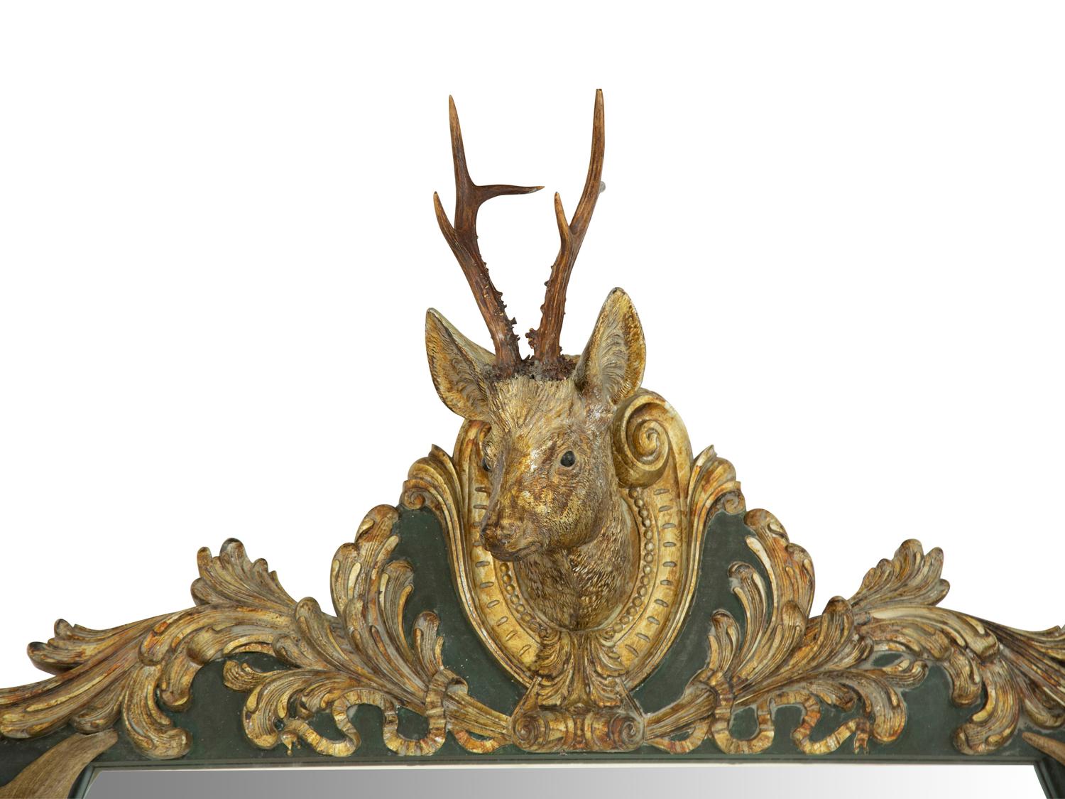 A Baroque Style Giltwood and Antler-Mounted Mirror