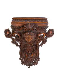 A Neoclassical Carved Oak Bracket, Height 21 inches.