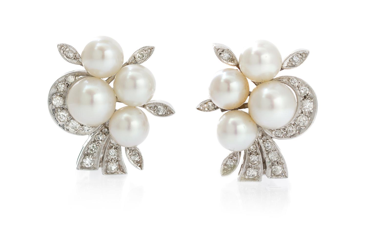 A Pair of White Gold, Diamond and Pearl Earclips, 7.80 dwts.