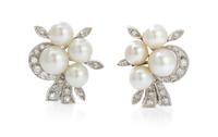A Pair of White Gold, Diamond and Pearl Earclips, 7.80 dwts.