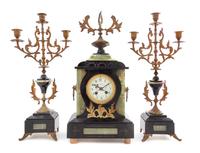 A Continental Gilt Metal Mounted Onyx and Slate Clock Garniture
