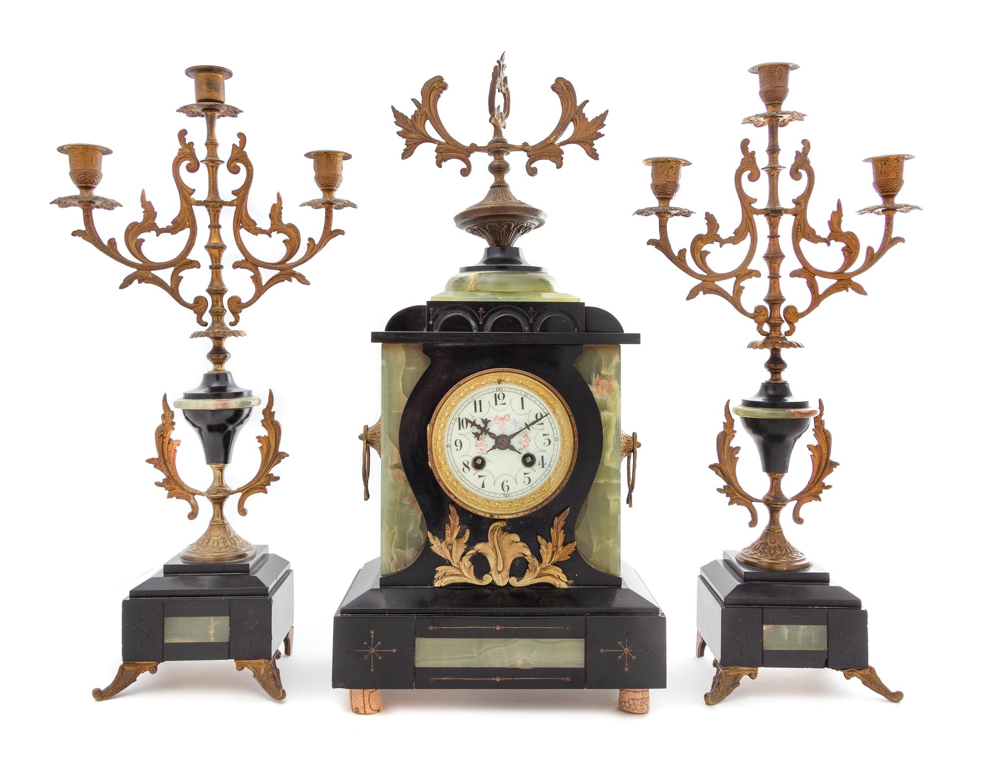 A Continental Gilt Metal Mounted Onyx and Slate Clock Garniture