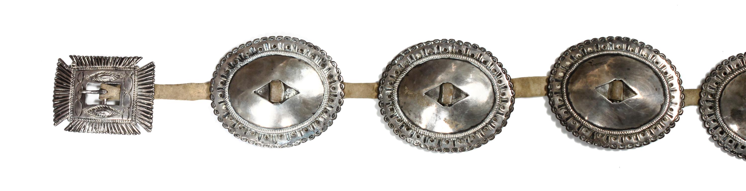 A Navajo First Phase Concho Belt Length overall 33 inches; concho 4 x 3 1/2; buckle 3 7/8 x 3 1/8 inches. — LATE 19TH/EARLY 20TH CENTURY