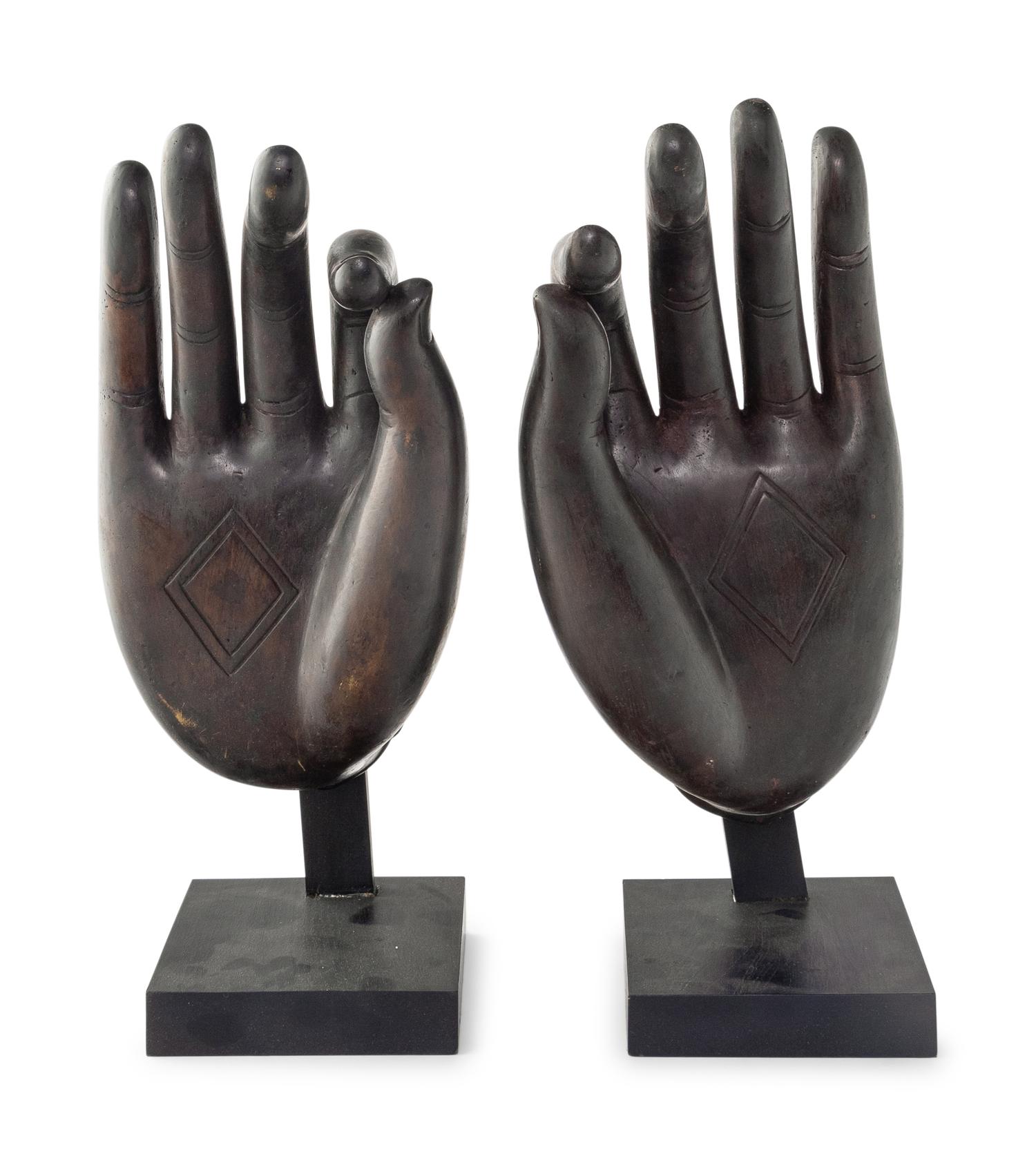 A Large Pair of Chinese Lacquered Bronze Buddha Hands