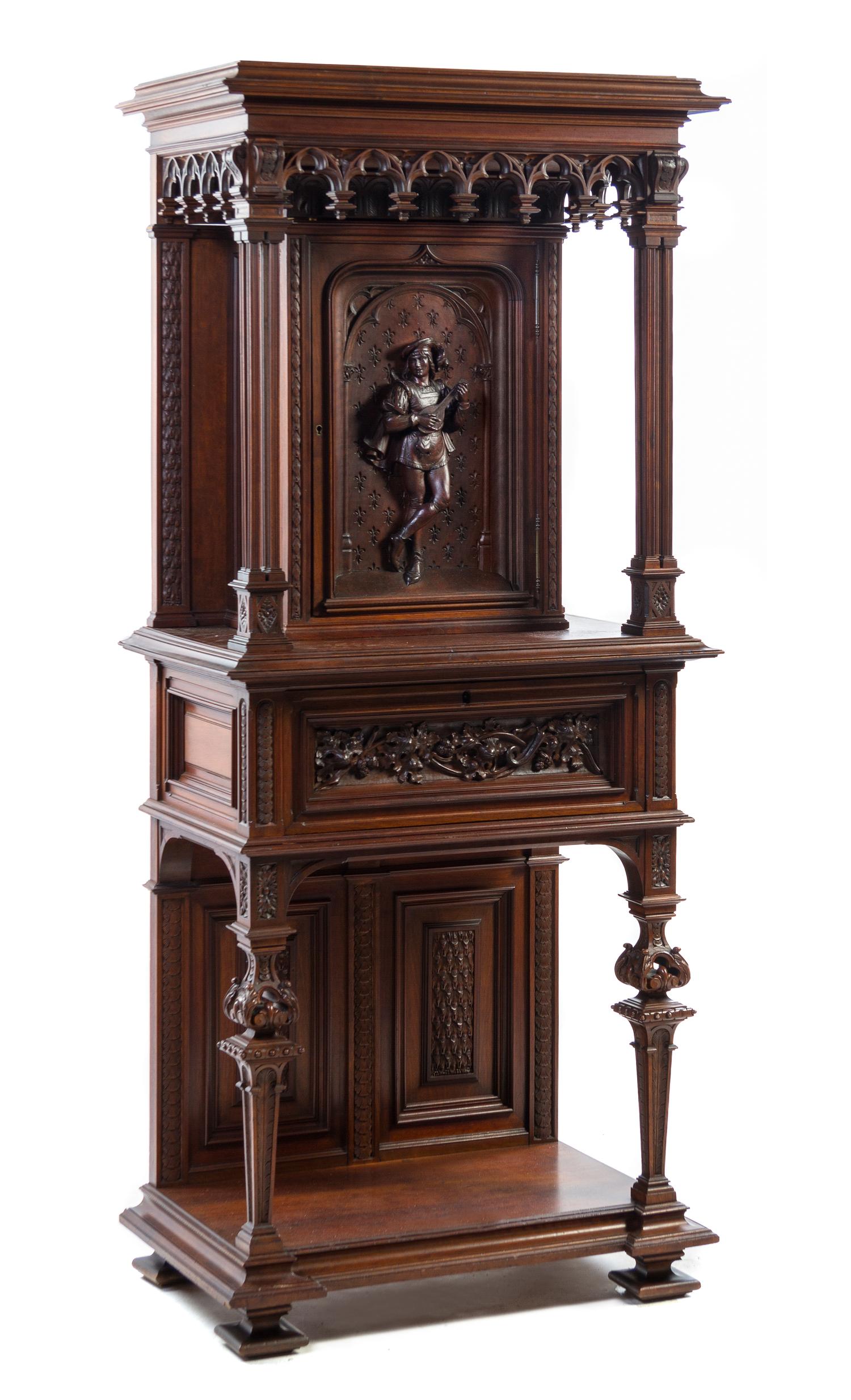 A Renaissance Revival Oak Court Cupboard, Height 73 1/2 x width 32 1/2 x depth 19 3/4 inches.