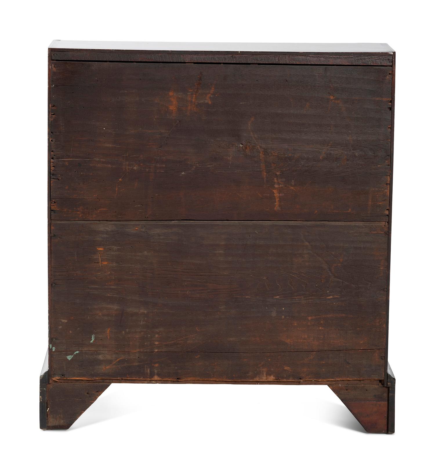 A Chippendale Figured and Shell-Carved Mahogany Slant Front Desk