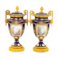 A Pair of Sèvres Style Porcelain, Enameled and Gilt Bronze Mounted Urns