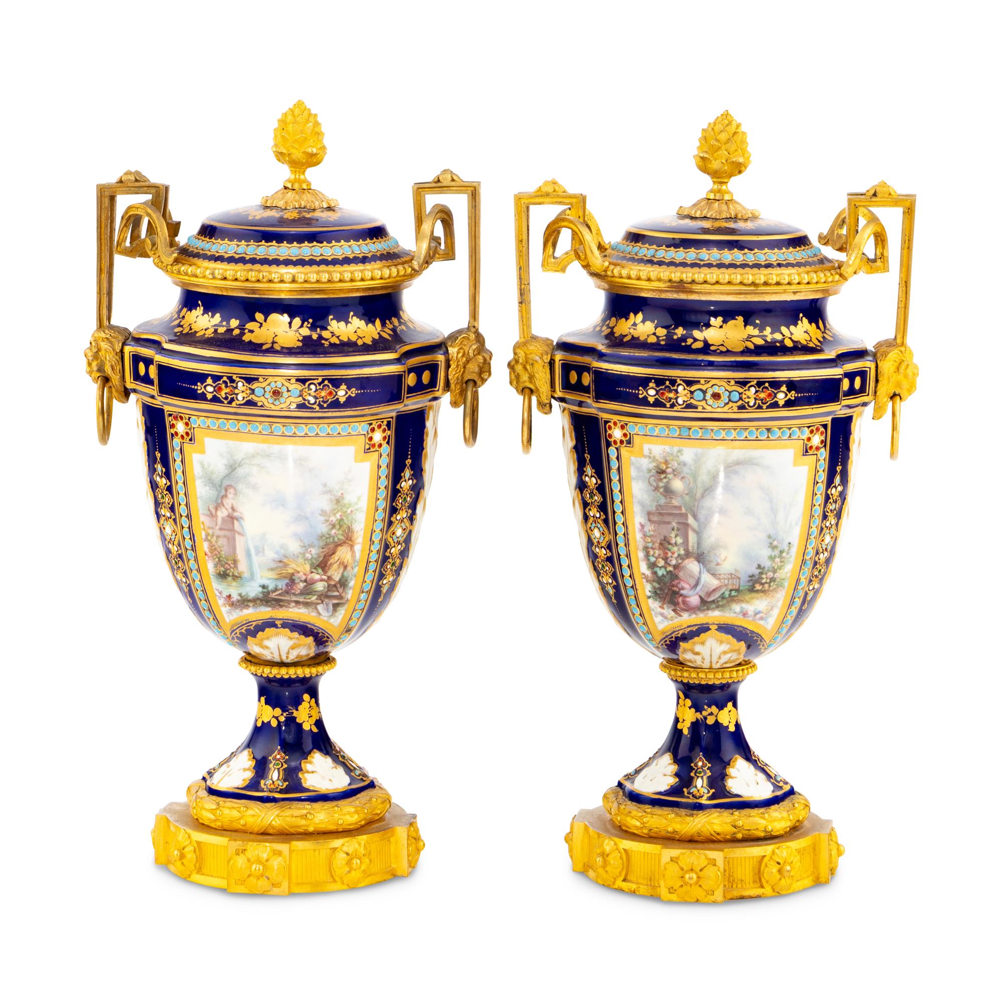 A Pair of Sèvres Style Porcelain, Enameled and Gilt Bronze Mounted Urns