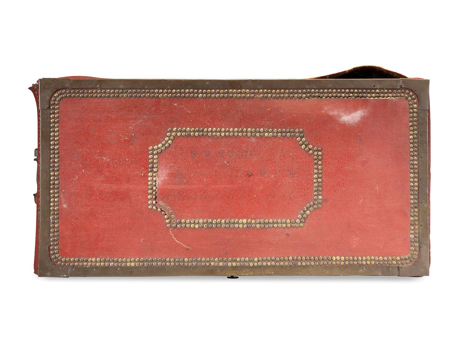 A China Trade Camphorwood Red Leather Clad and Brass Tack-Decorated Trunk