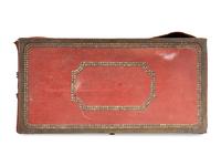 A China Trade Camphorwood Red Leather Clad and Brass Tack-Decorated Trunk
