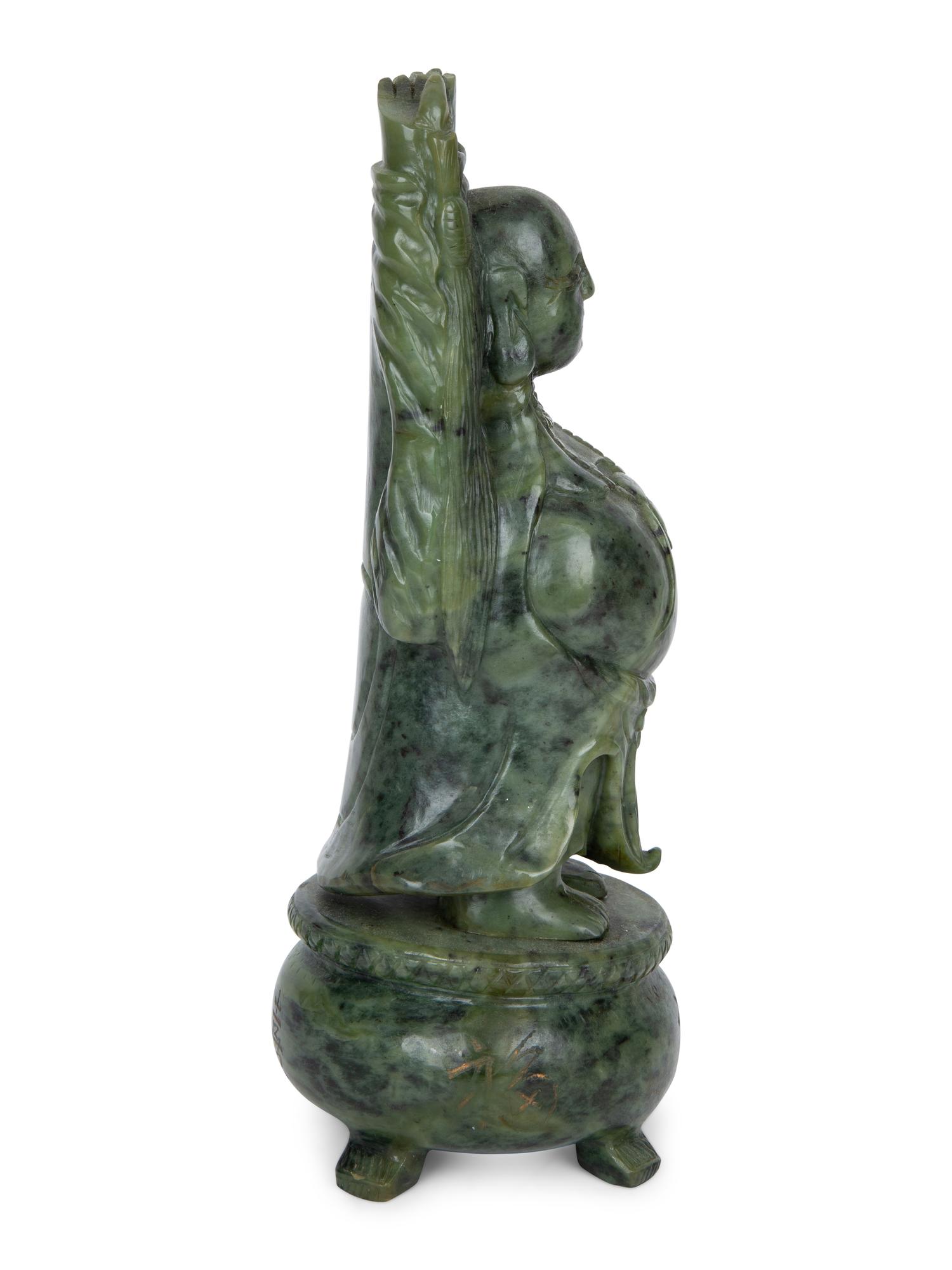 A Chinese Carved Spinach Jade Laughing Buddha — 20TH CENTURY
