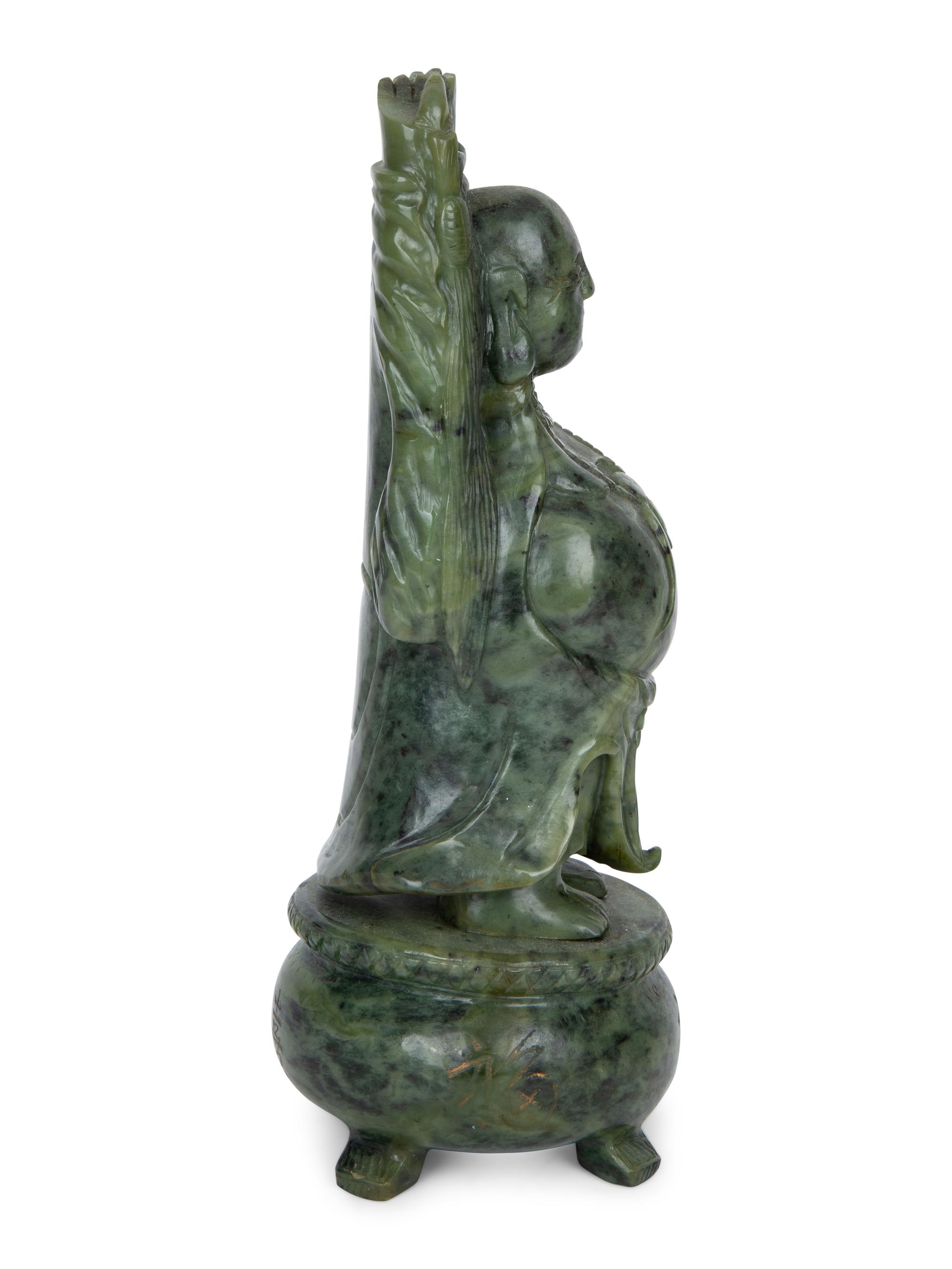 A Chinese Carved Spinach Jade Laughing Buddha — 20TH CENTURY