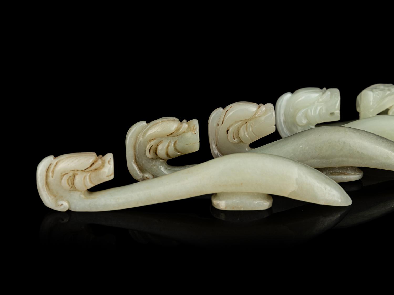 Four Chinese Celadon Jade 'Chilong' Belt Hooks