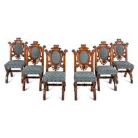 A Set of Six French Carved Oak Dining Chairs