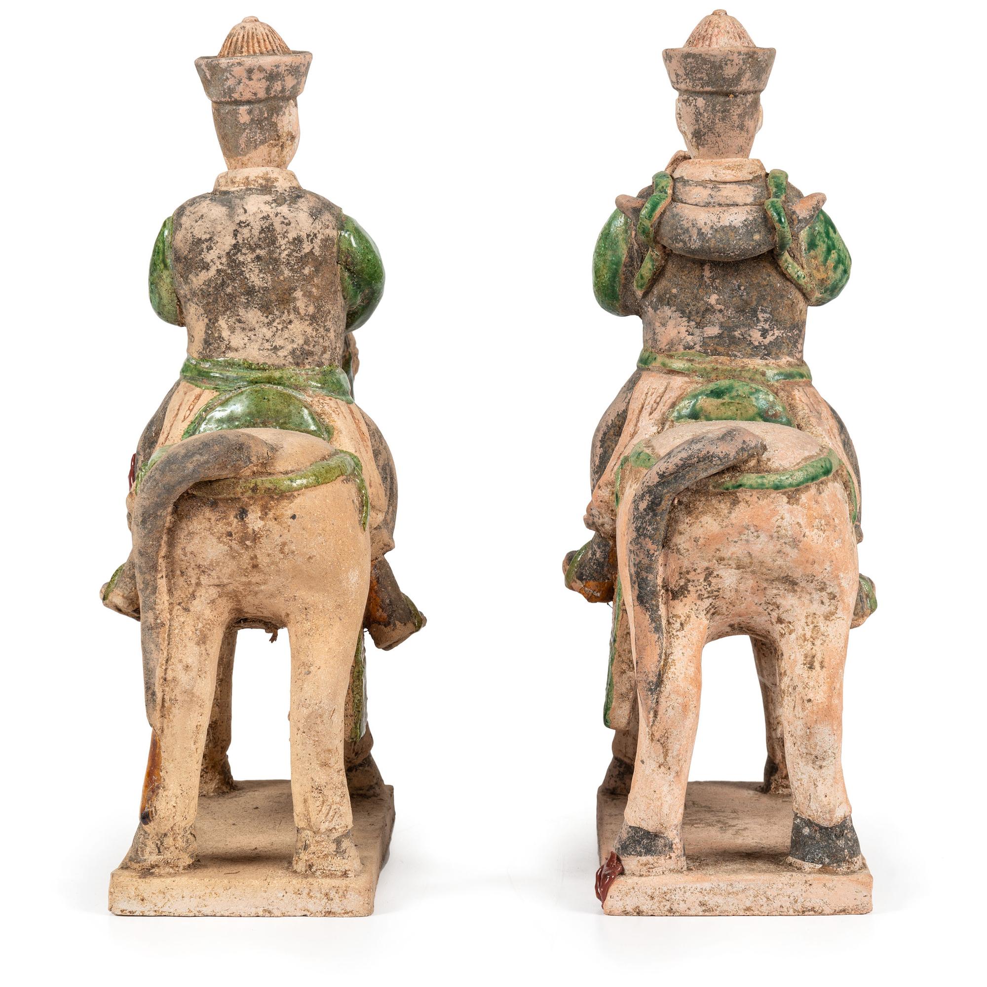 A Pair of Terracotta Equestrian Musician Figures