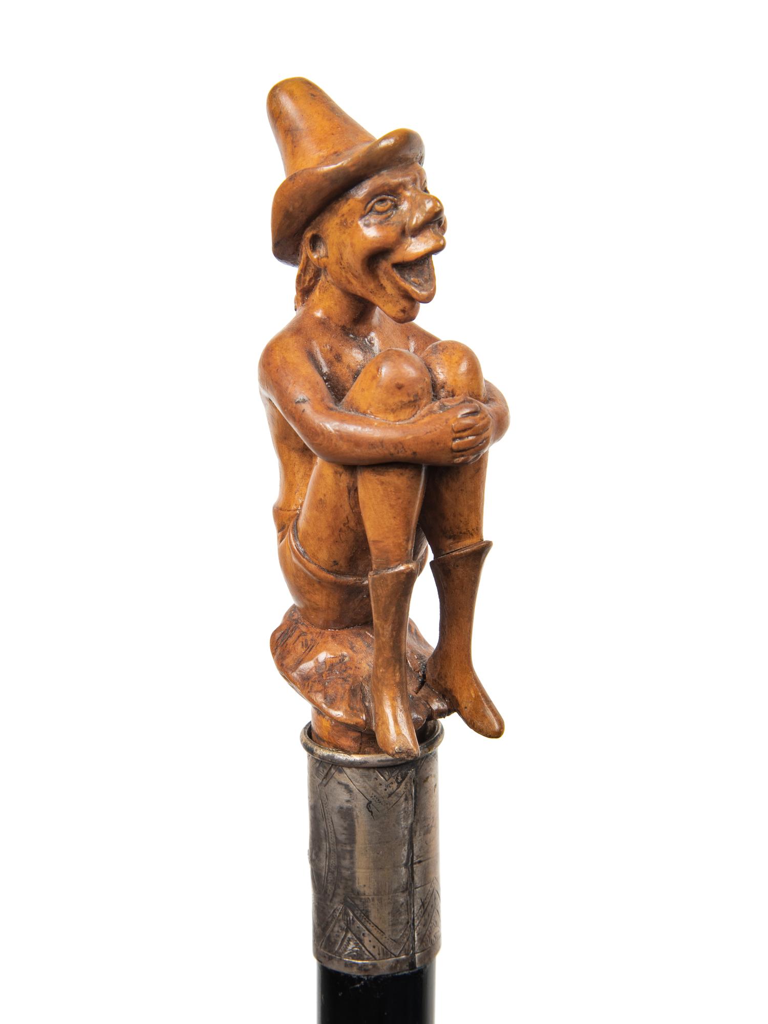 Three Continental Carved Wood Figural Canes