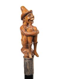 Three Continental Carved Wood Figural Canes