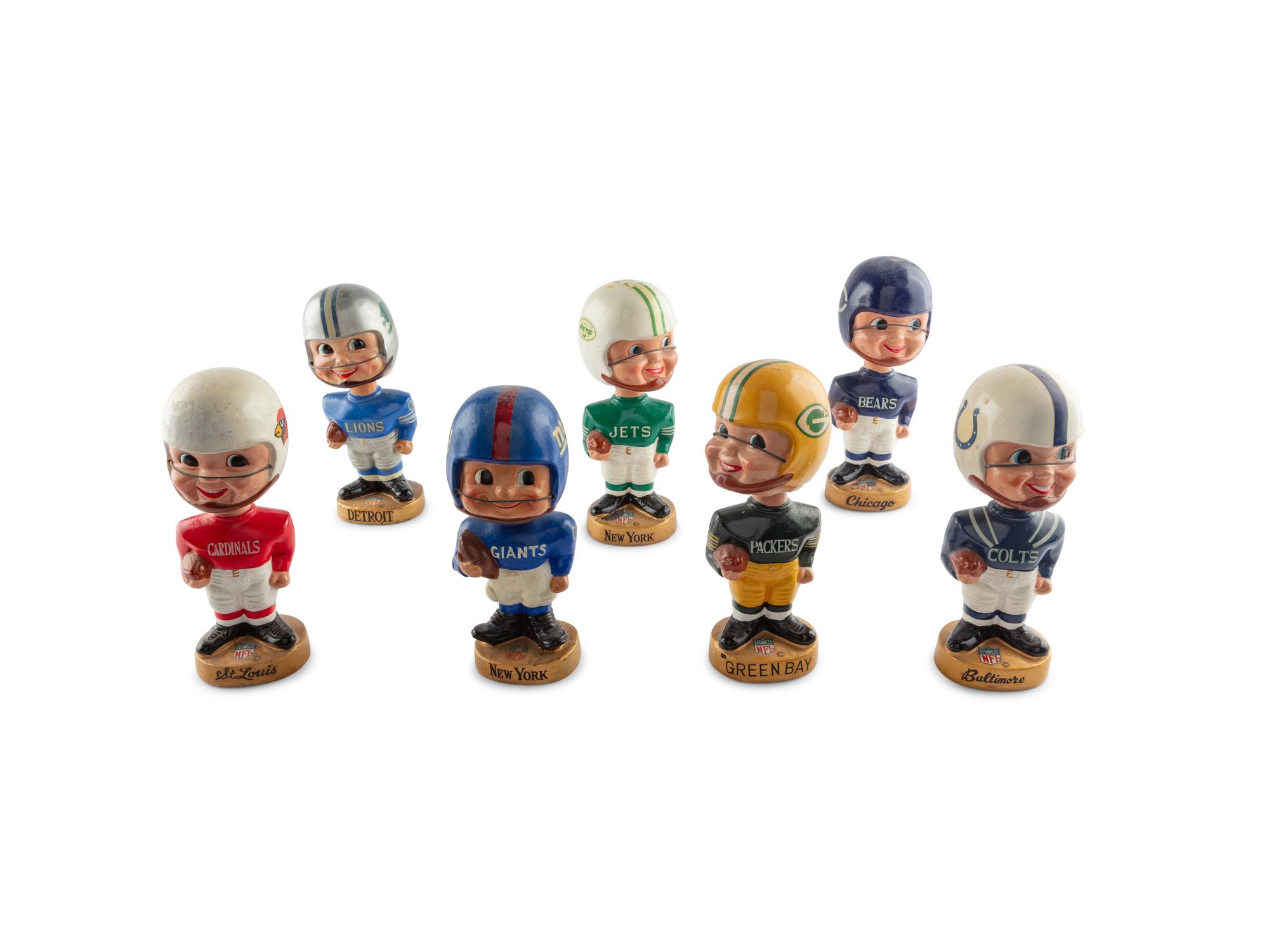 A Group of Seven Vintage NFL Bobblehead Nodder Figures