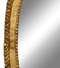 A Louis XVI Style Giltwood Mirror — 19TH CENTURY