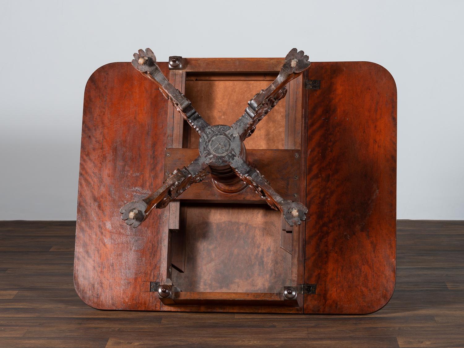 A Classical Highly Carved Cherrywood Drop-Leaf Dining Table