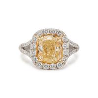 FANCY LIGHT YELLOW DIAMOND AND DIAMOND RING