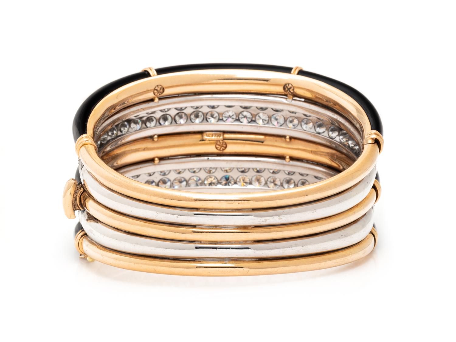 DIAMOND, BLACK ONYX, AND BICOLOR GOLD BANGLE BRACELET