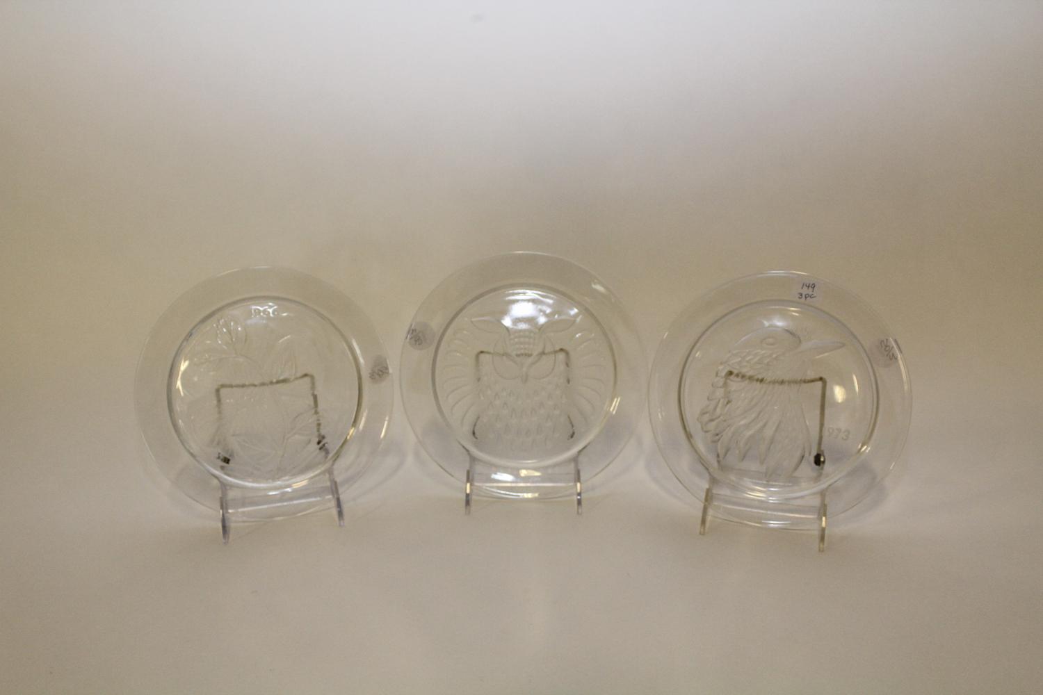Three Lalique Glass Collector's Plates. Diameter 8 1/4 inches.
