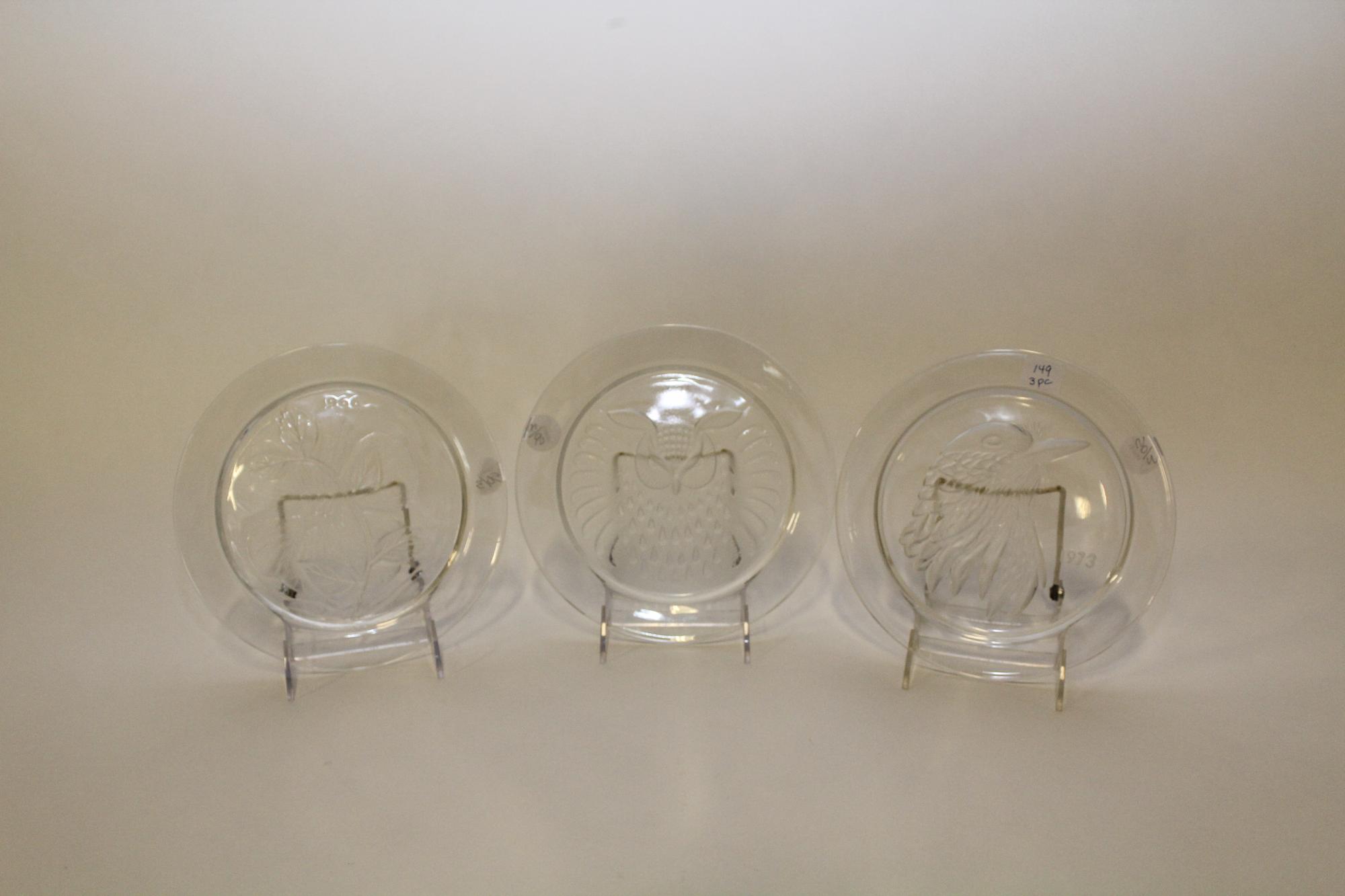 Three Lalique Glass Collector's Plates. Diameter 8 1/4 inches.
