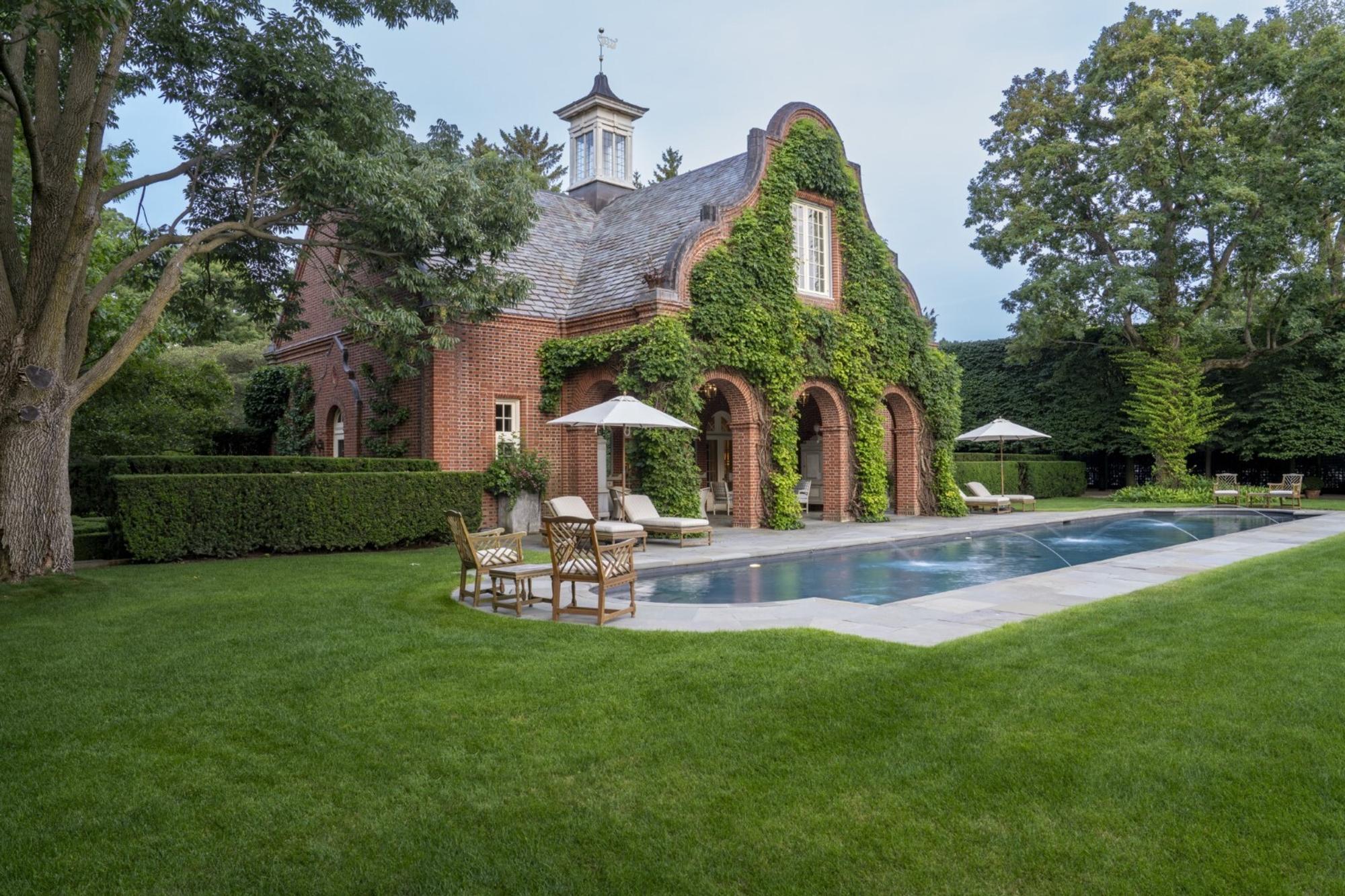 A Pair of Continental Trompe l'Oeil-Carved and Painted Console Tables
