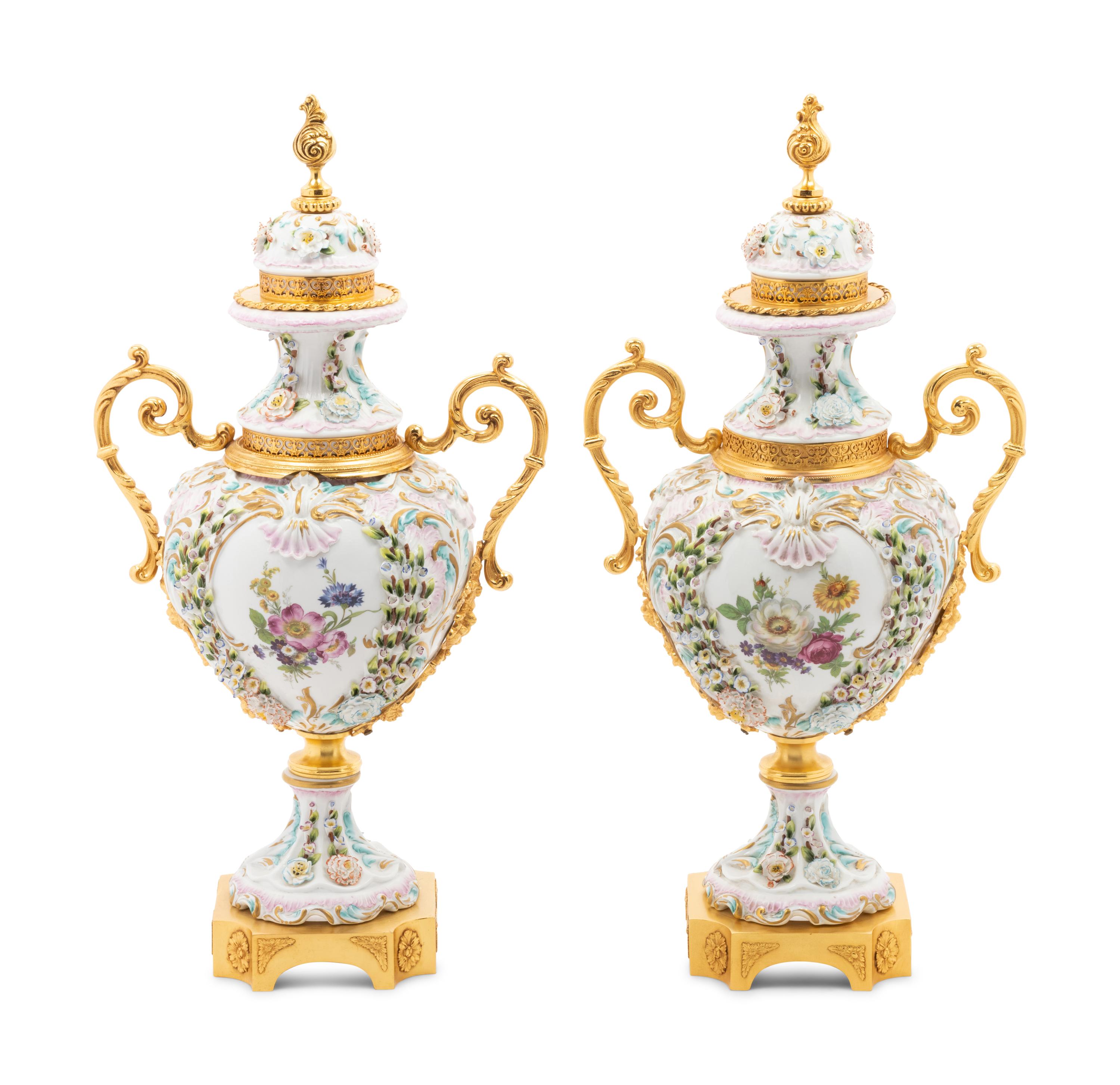 A Pair of Tiche Gilt Metal Mounted Porcelain Urns