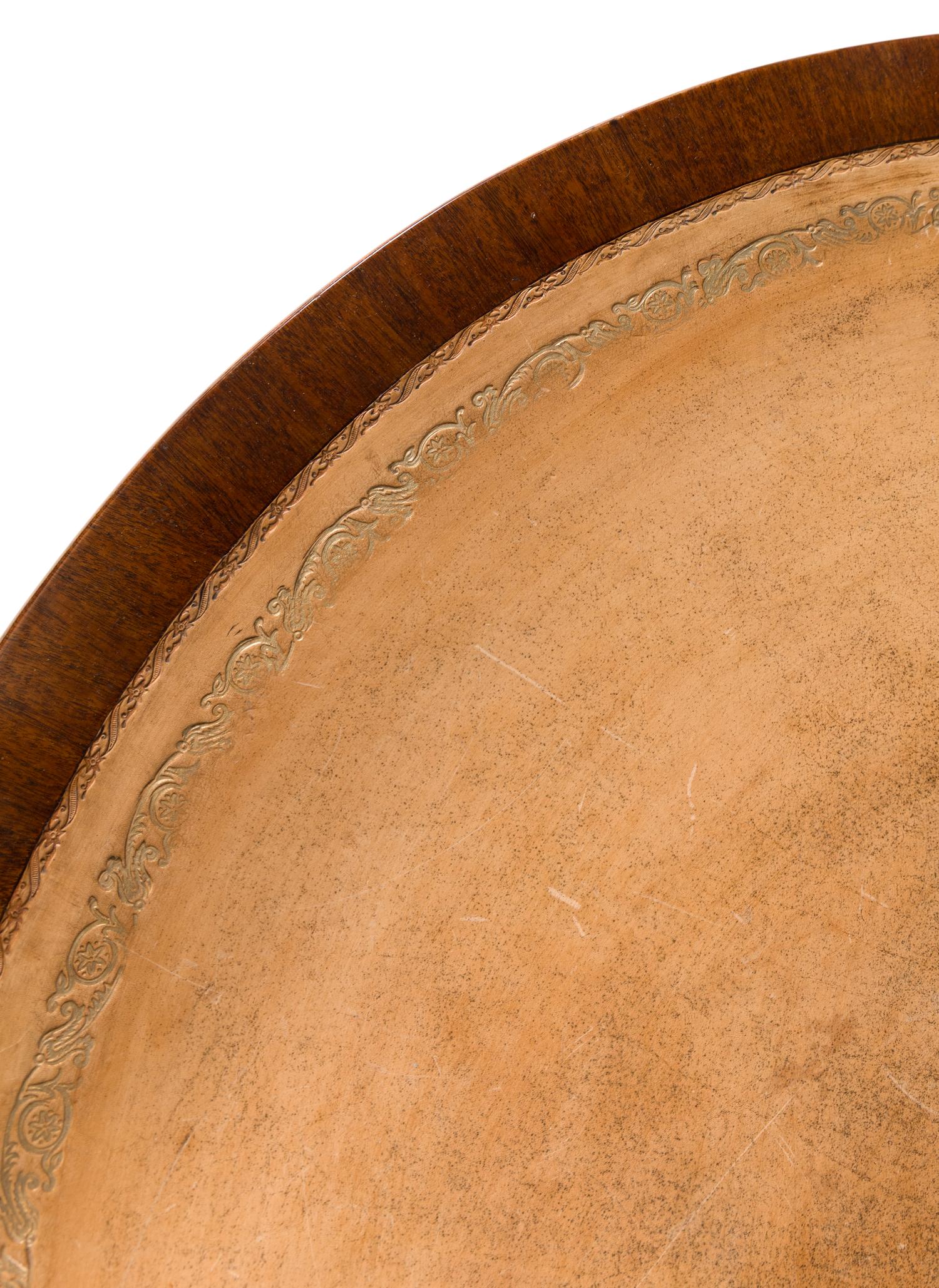 A George III Mahogany and Parcel Ebonized Drum Table