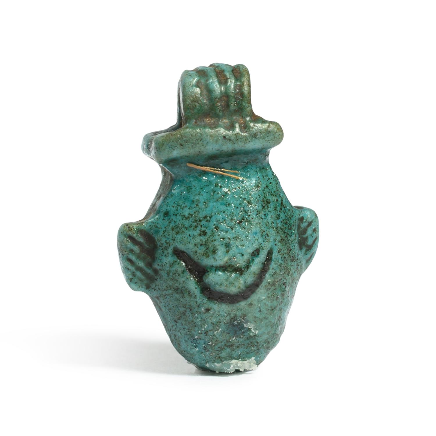 An Egyptian Faience Heart Amulet
