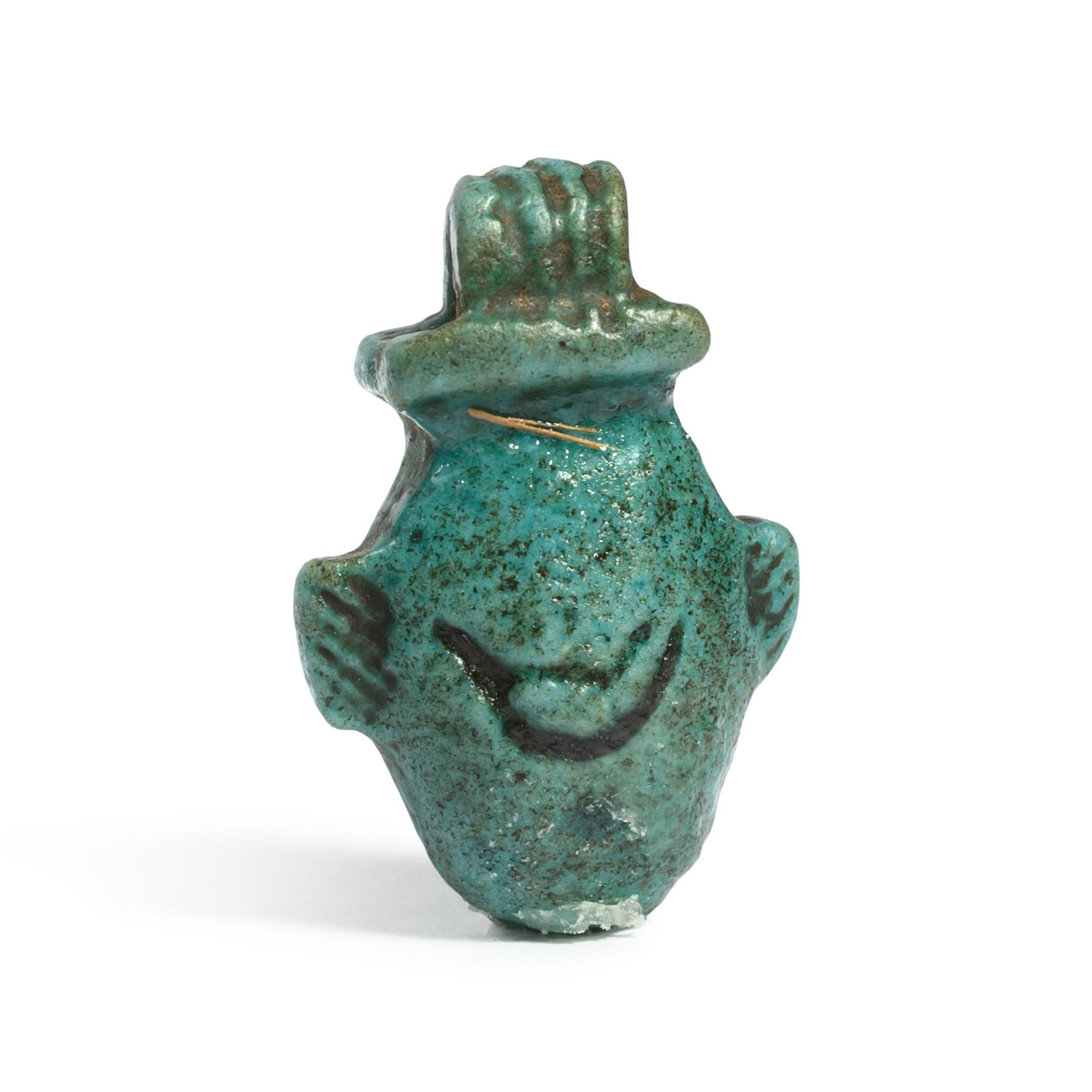 An Egyptian Faience Heart Amulet