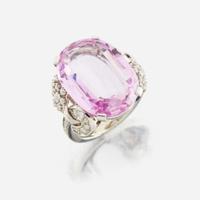 An 18K white gold, pink topaz, and diamond ring