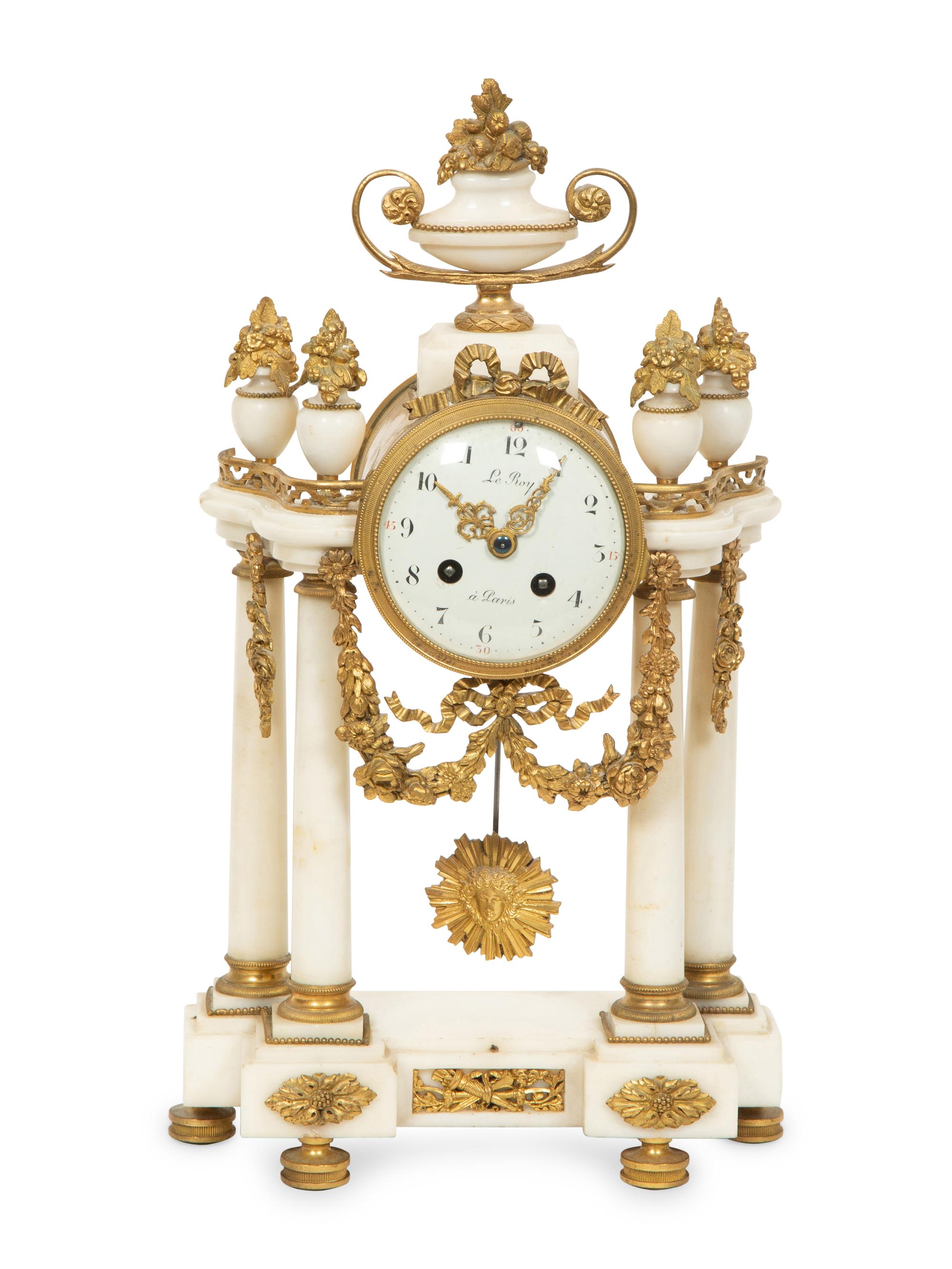 An Empire Style Gilt Bronze Mounted Marble Portico Clock