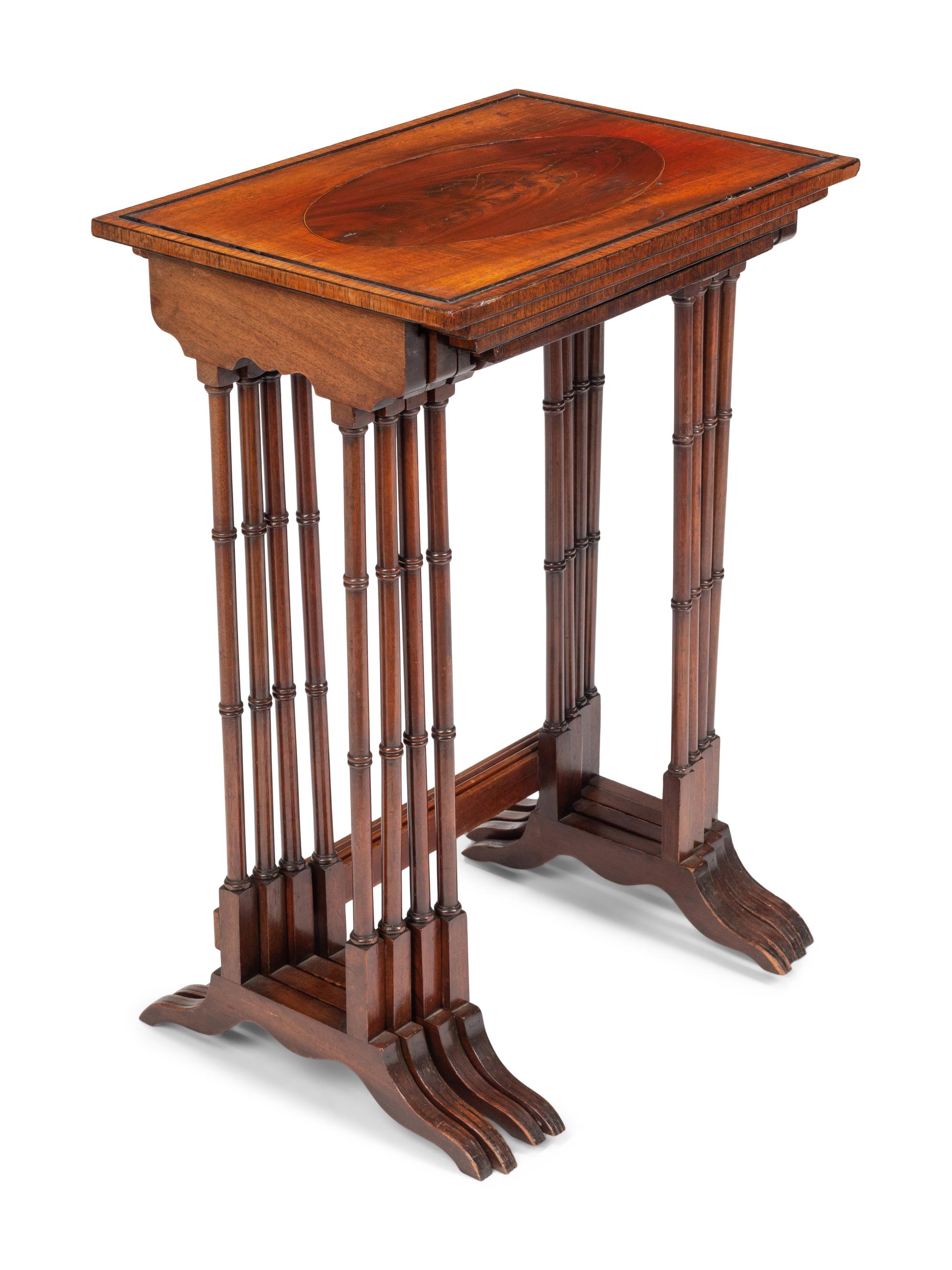 A Set of Four Edwardian Mahogany Nesting Tables