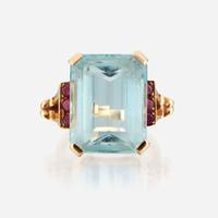 An aquamarine, ruby, and gold ring