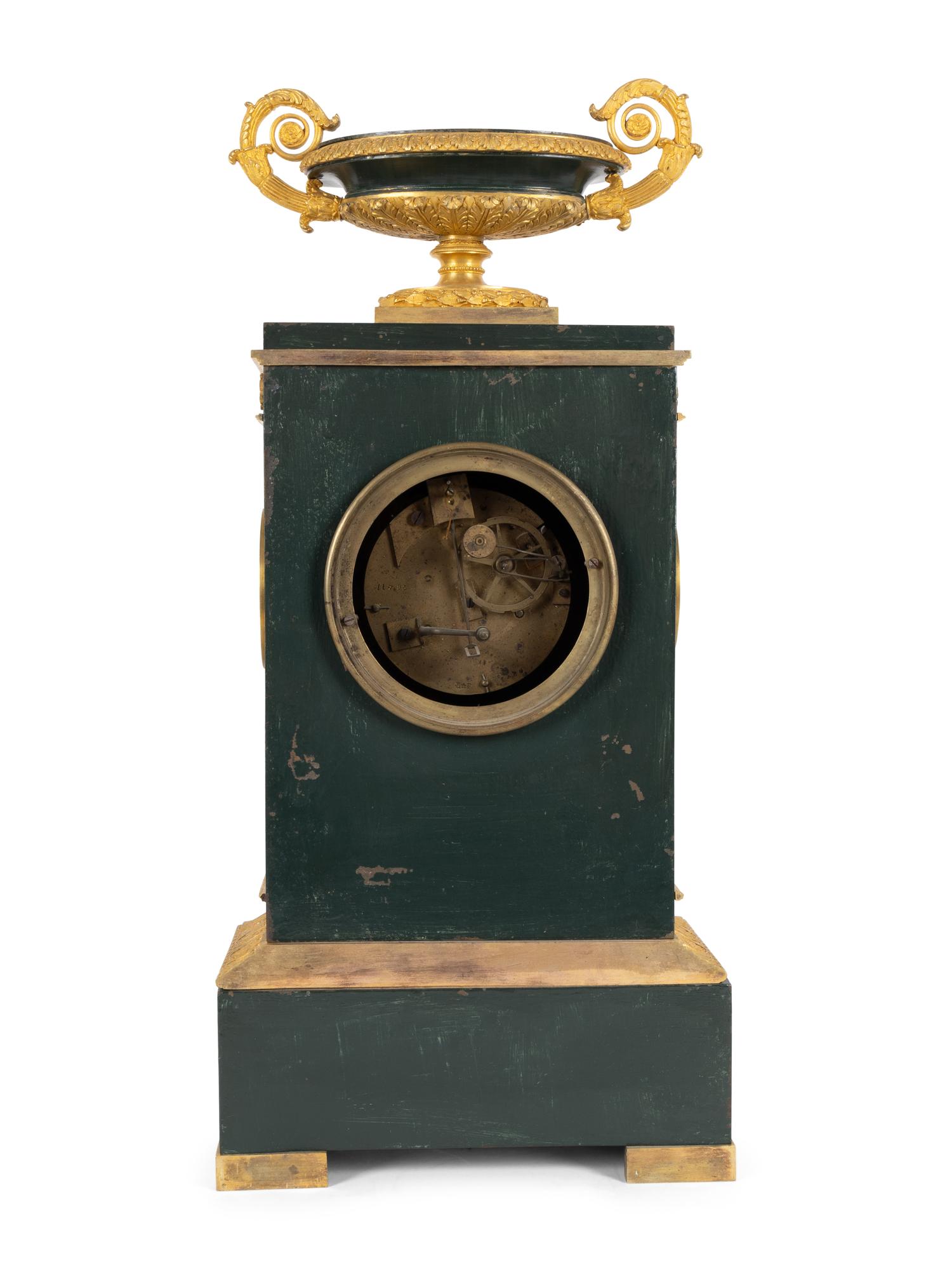 An Empire Gilt Bronze and Tôle Peinte Mantel Clock