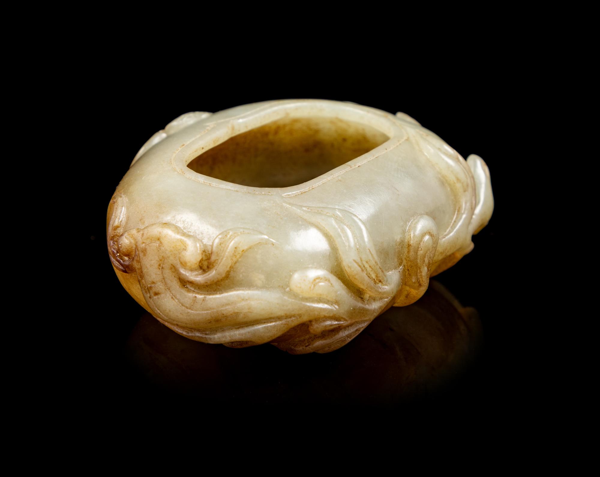 A Chinese Celadon Jade Water Coupe