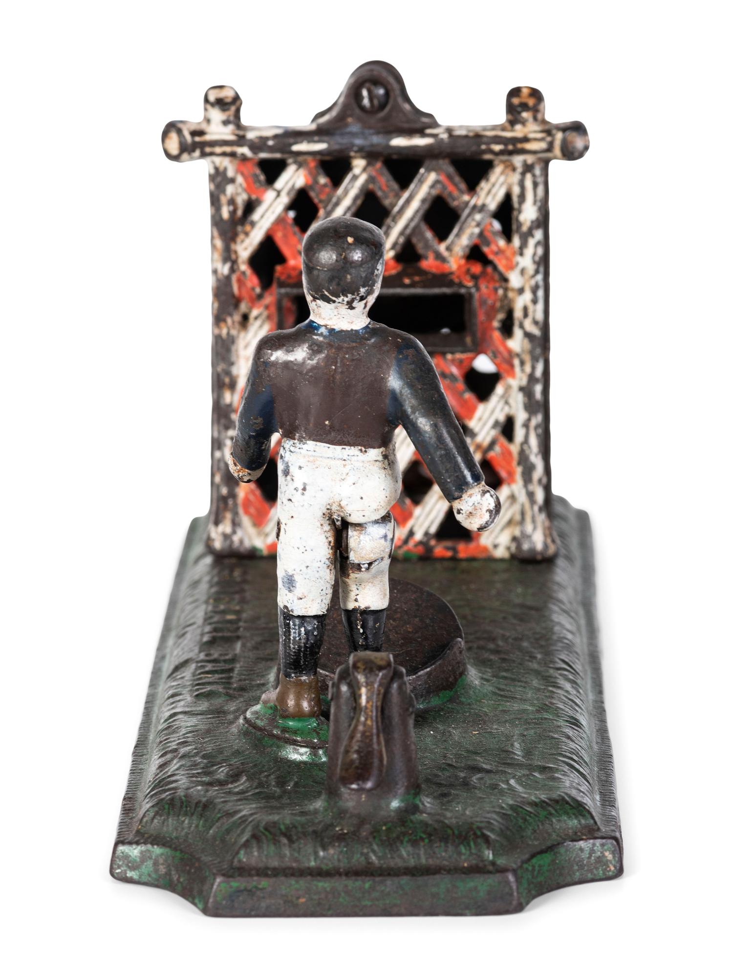 An English 'Football' Cast Iron Mechanical Bank