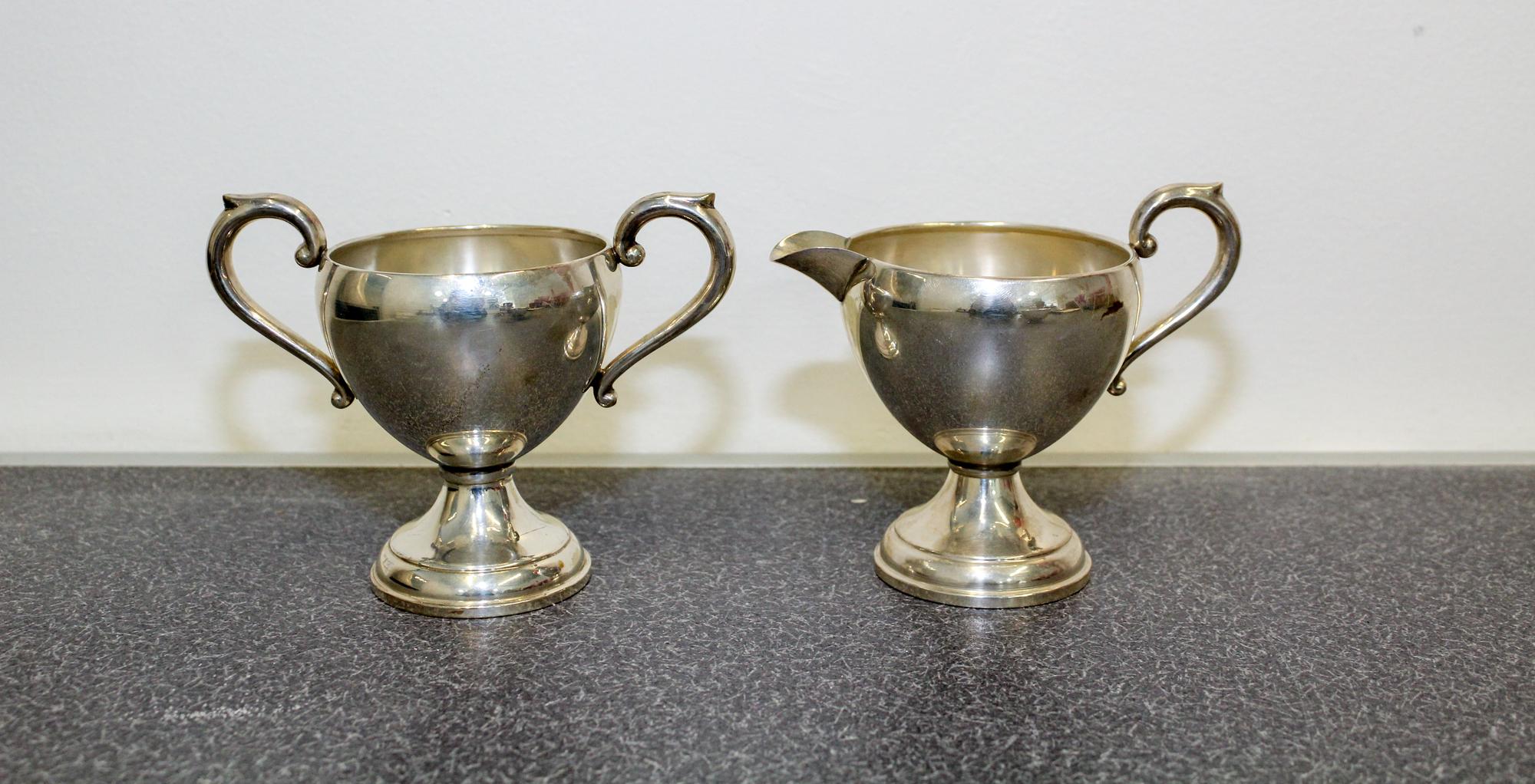 An American Silver Creamer and Sugar, Preisner Silver Co., Wallingford, CT, each of baluster form, weighted.