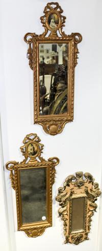 A Pair of Italian Carved and Silvered Mirrors Height of pair 24 x width 13 inches.