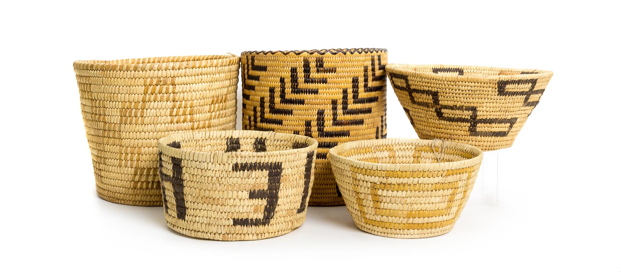 A Group of Fourteen Tohono O'odham Baskets Height of tallest 16 3/4 inches.