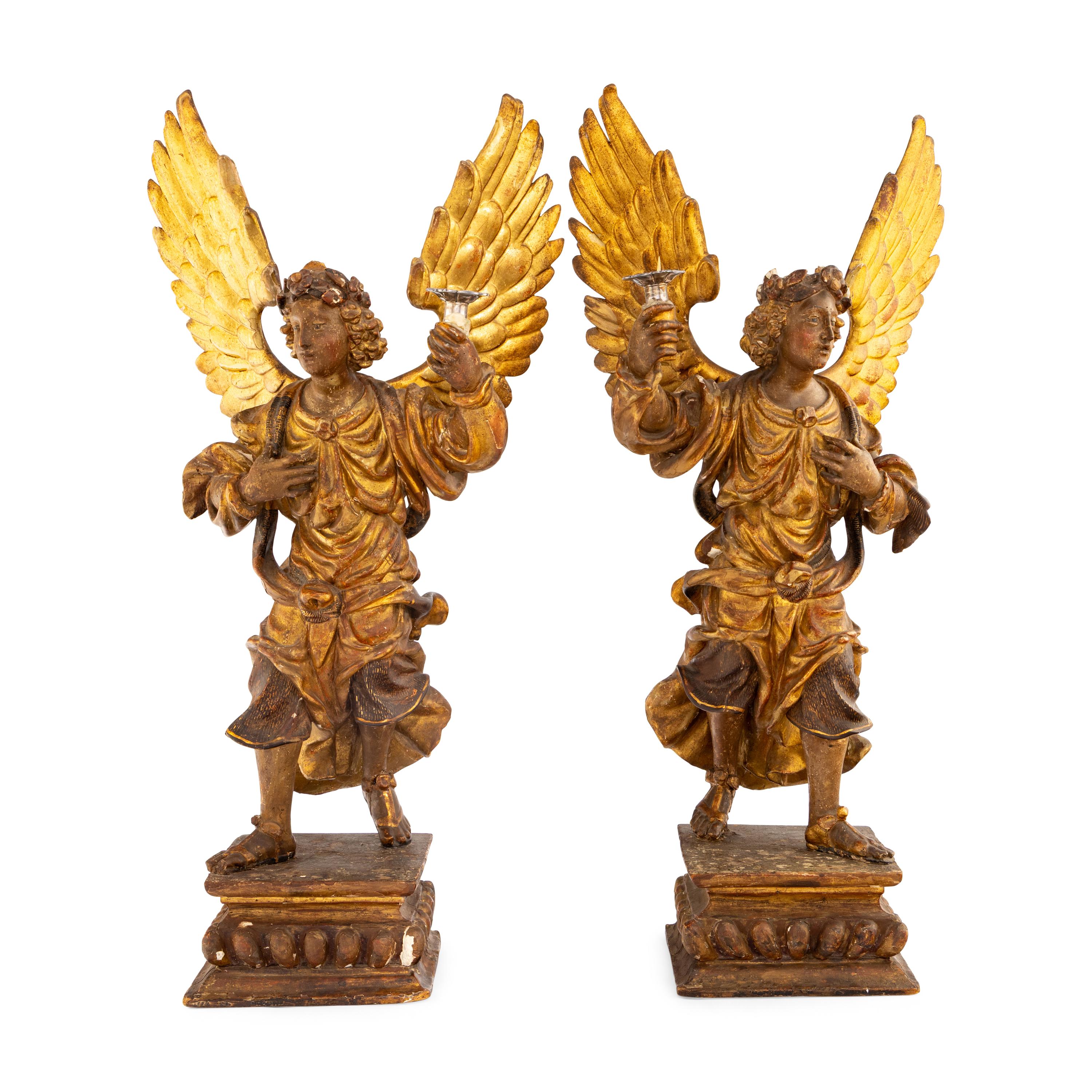 A Pair of Italian Painted and Parcel Gilt Figural Altar Prickets
