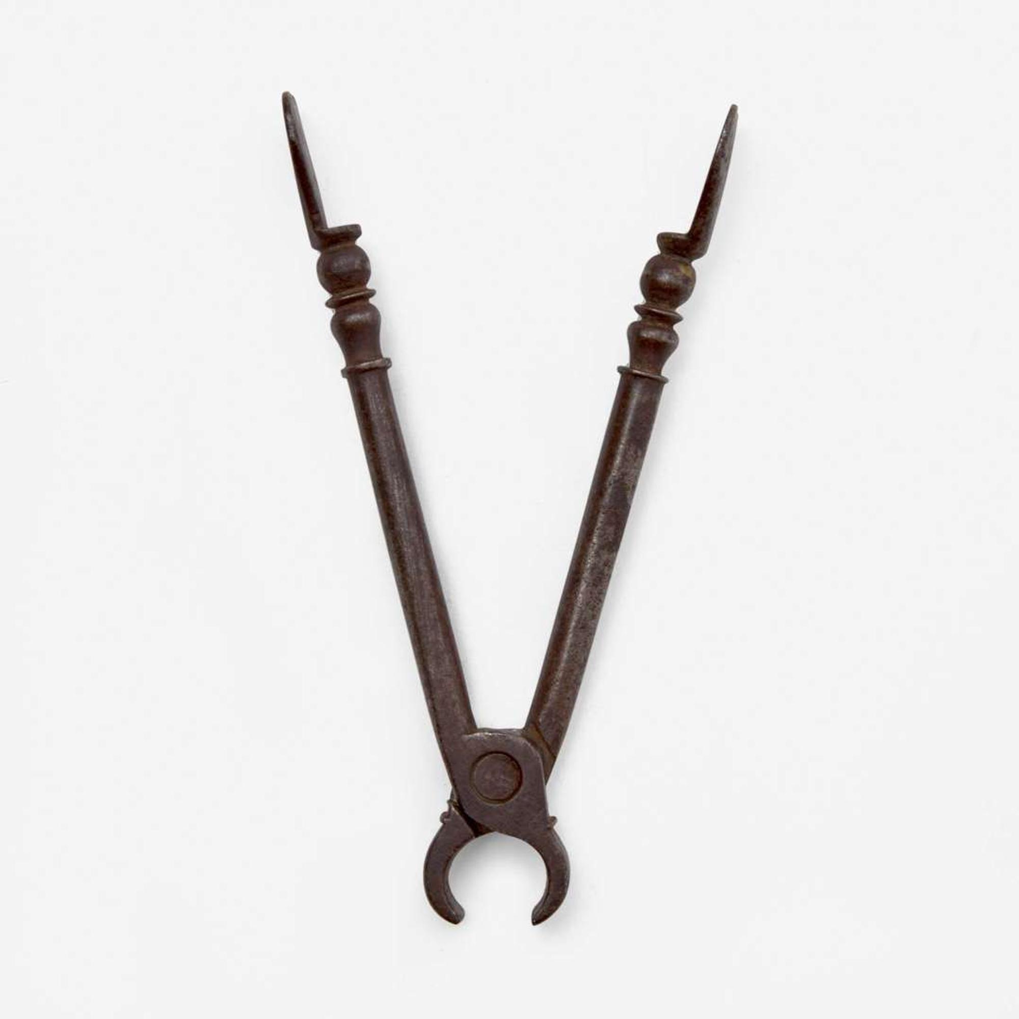 An unusual set of iron sugar nippers Dated "1785"